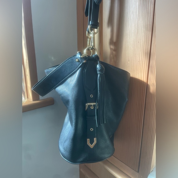 Michael Kors Handbags - Michael Kors Barrel Bag Black Leather purse bucket tote tassel buckle hardware